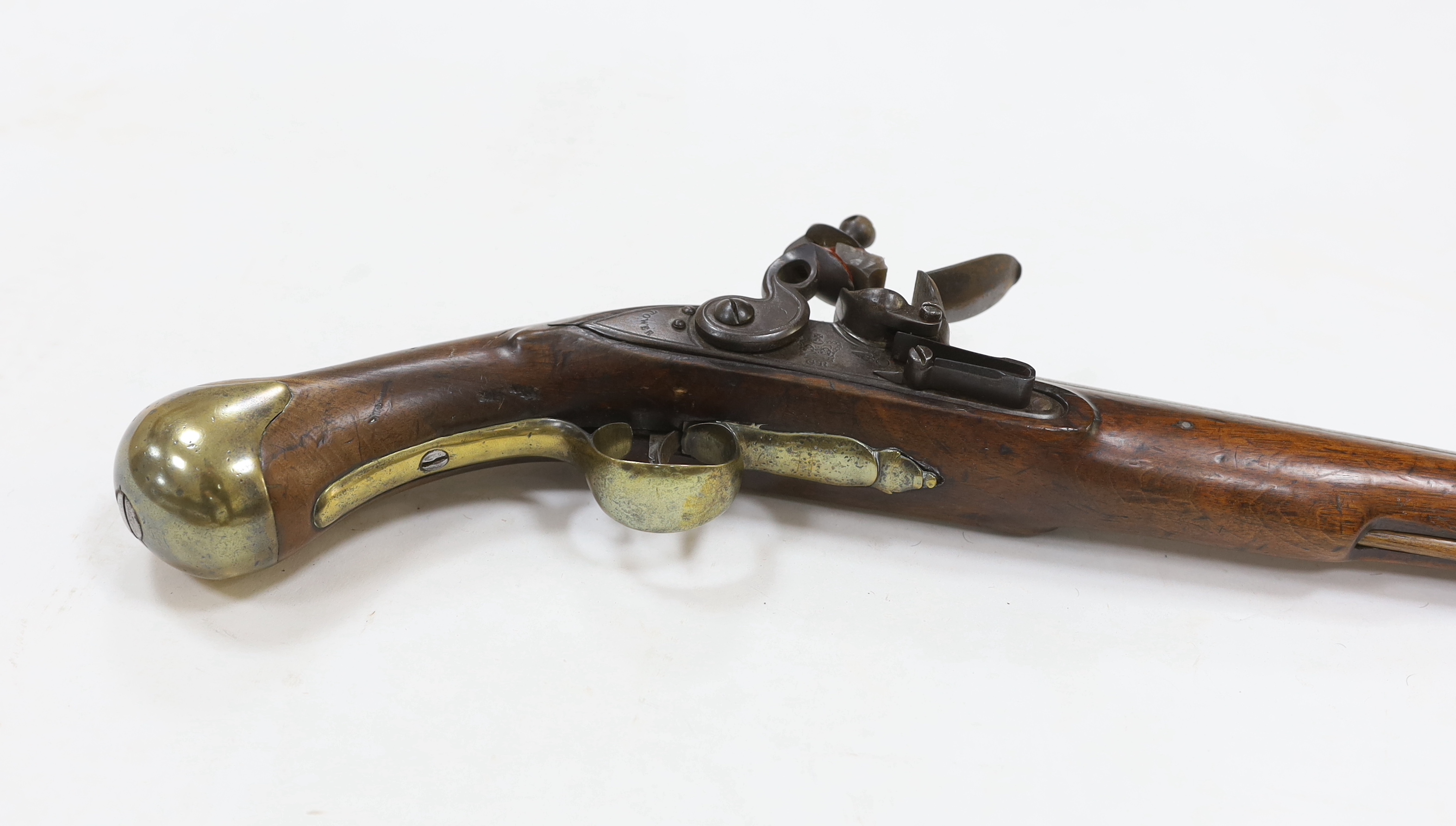 An early 19th century flintlock pistol, fully stocked with Tower proofs and crown over GR stamp to lock, plain brass butt cap and trigger guard